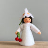 A felt Cherry Flower Fairy wearing a white dress and cherry flower on her head with light/medium skin tone holding a pair of cherries | © Conscious Craft